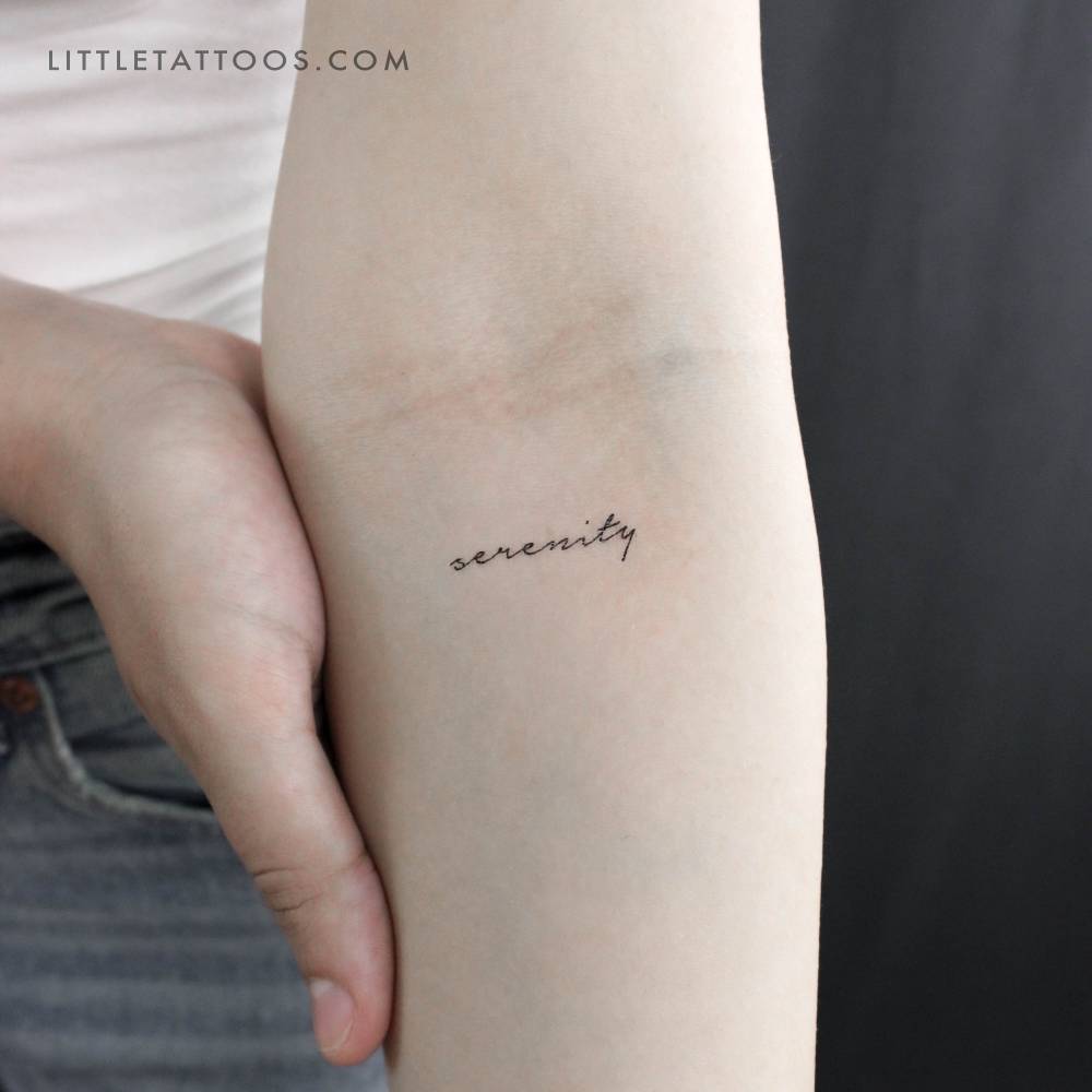 Handwritten font word "serenity" temporary tattoo.