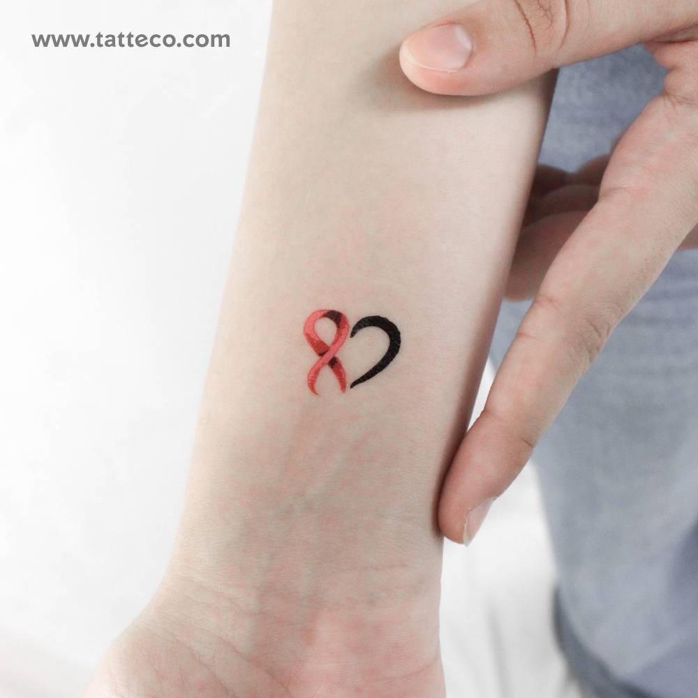 Cancer awareness heart temporary tattoo located on the wrist.