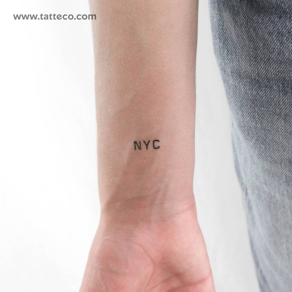 "NYC" temporary lettering tattoo located on the wrist.
