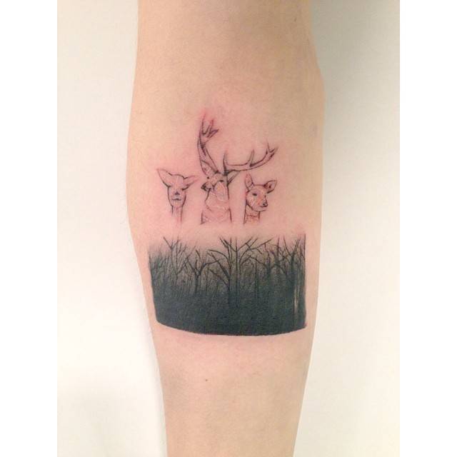 Deer family tattoo located on the inner forearm, illustrative style.
