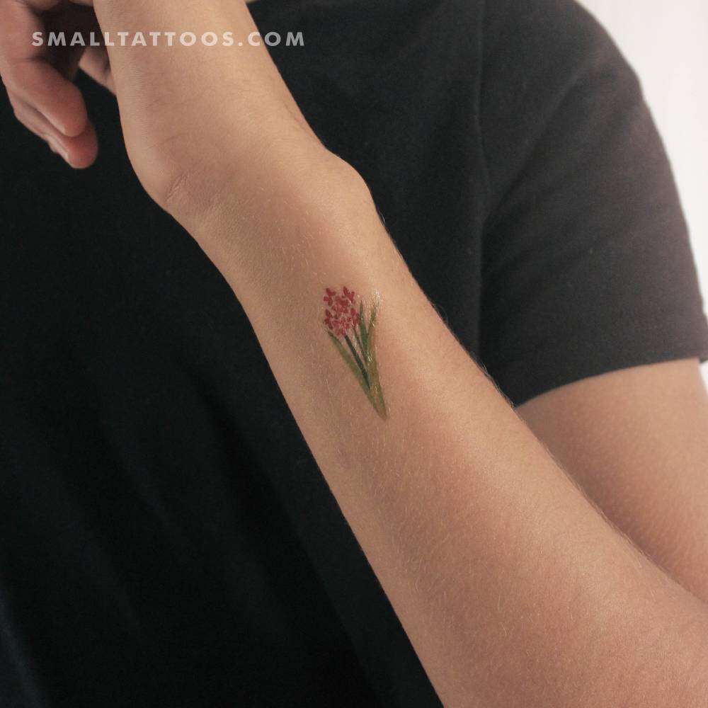 Watercolor style orange flower temporary tattoo by Zihee.