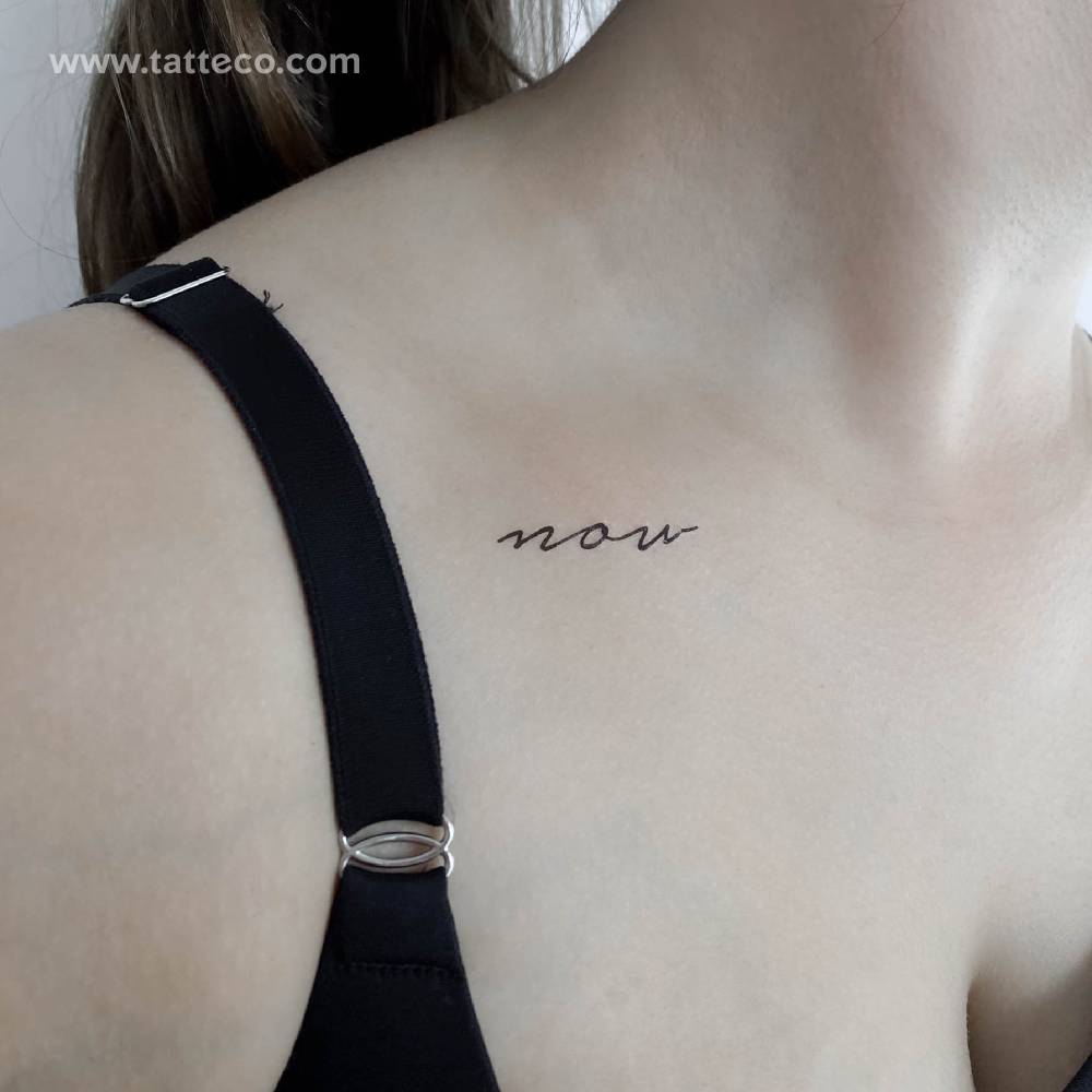 Handwritten font word "now" temporary tattoo located on the collarbone.