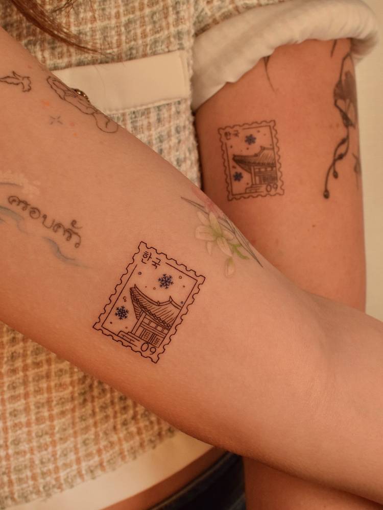 Matching Korean stamps tattoo for best friends.