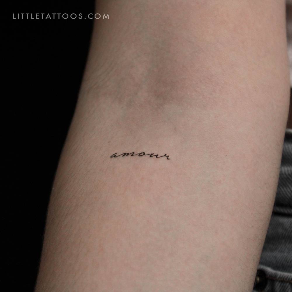 Handwritten font word "amour" temporary tattoo.