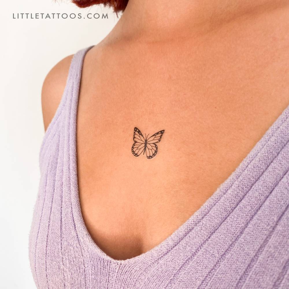 Butterfly temporary tattoo placed on the chest.