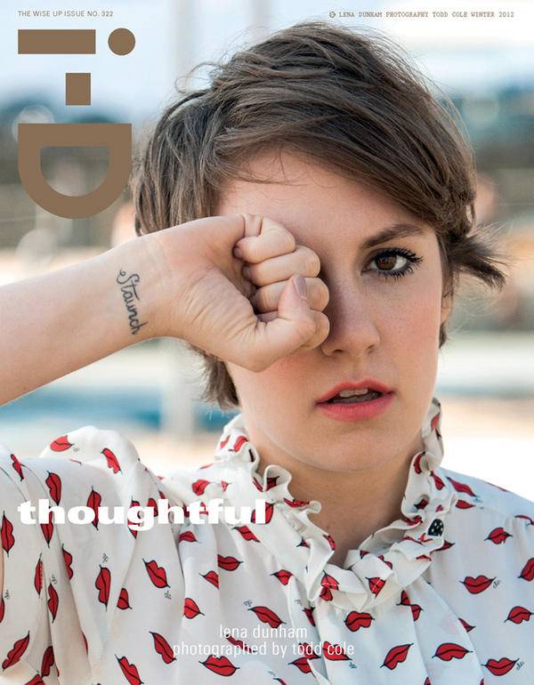 Lettering tattoo of the word "staunch" located on Lena Dunham's wrist.