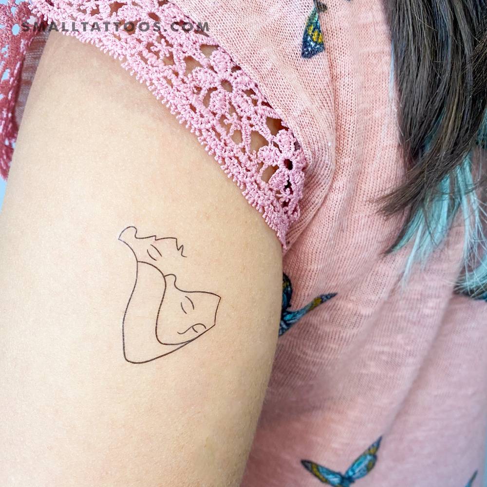 Siesta temporary tattoo located on the upper arm.