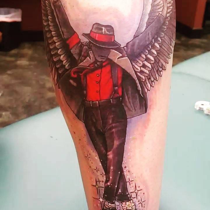 Michael Jackson as an angel tattooed on Prince Jackson's calf.