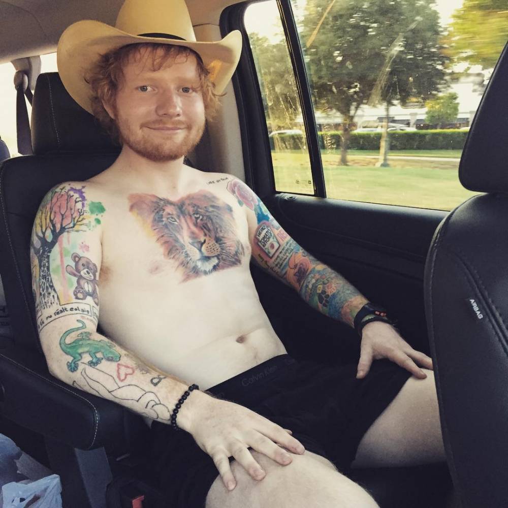 Ed Sheeran's arms and chest tattoos.