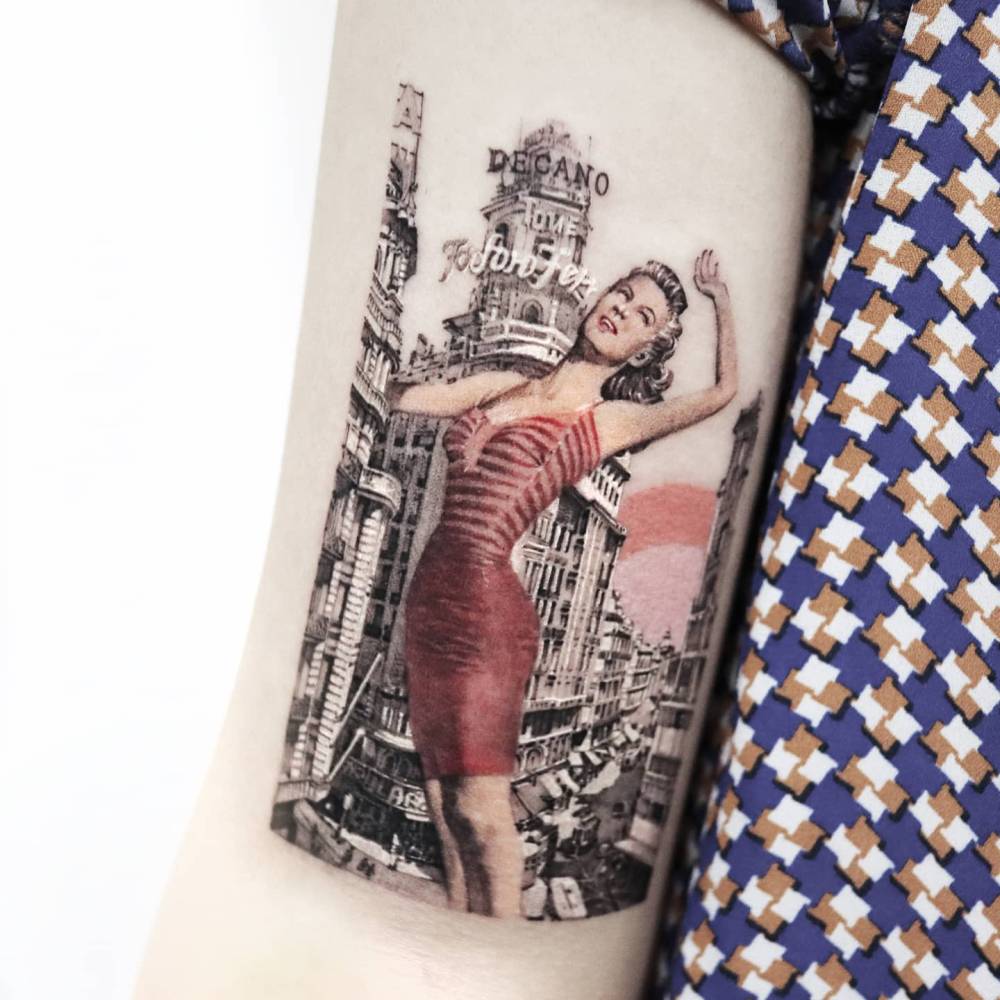 Vintage style pin-up tattooed on the inner arm, micro-realistic style.