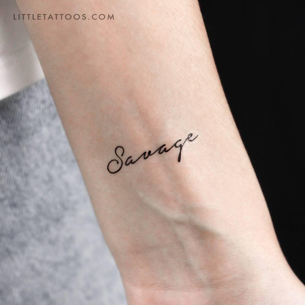 "Savage" temporary lettering tattoo located on the wrist.
