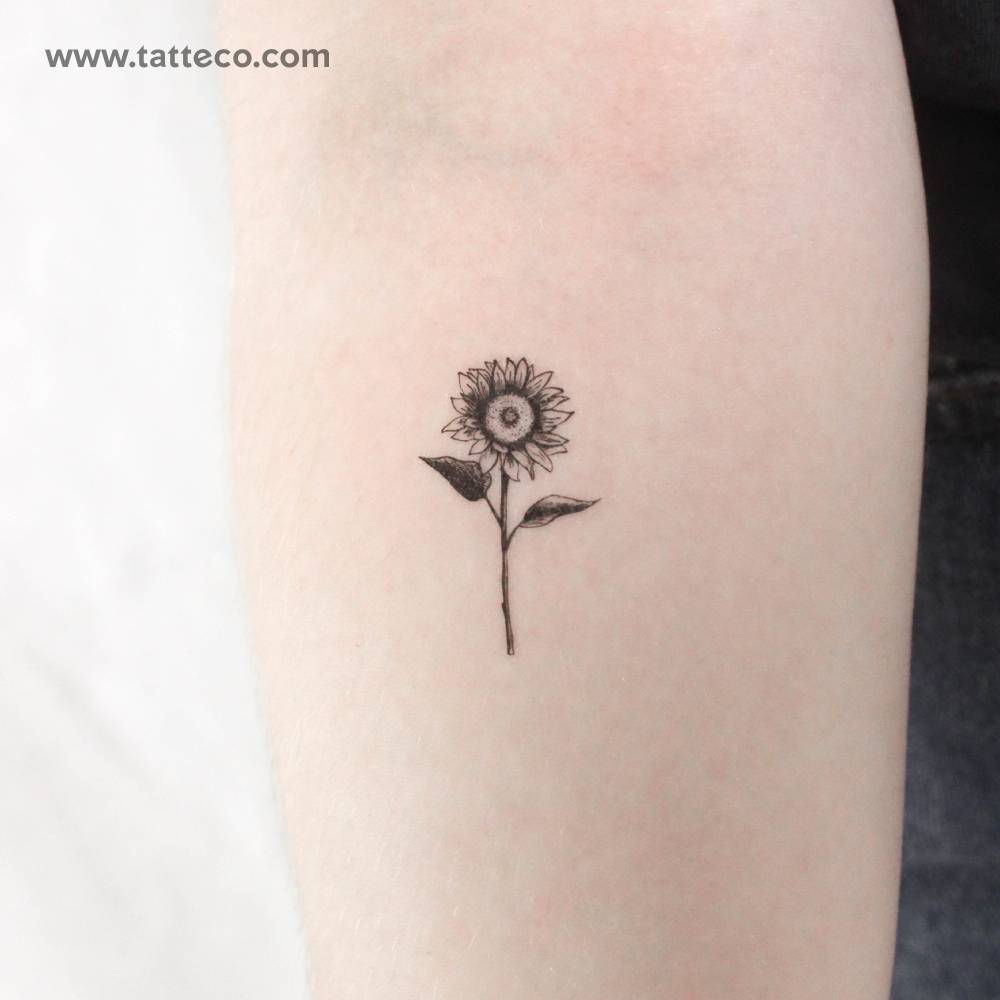 Sunflower temporary tattoo located on the inner forearm.