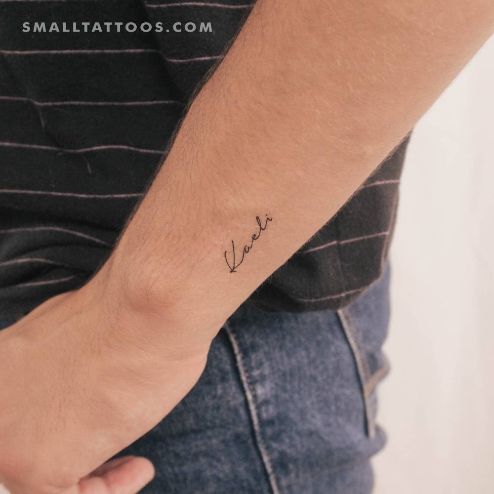 "Kaeli" temporary lettering tattoo placed on the wrist.