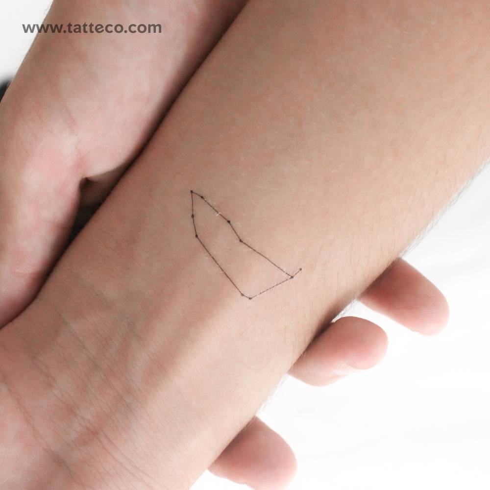 Small minimalist Capricornus constellation temporary tattoo.