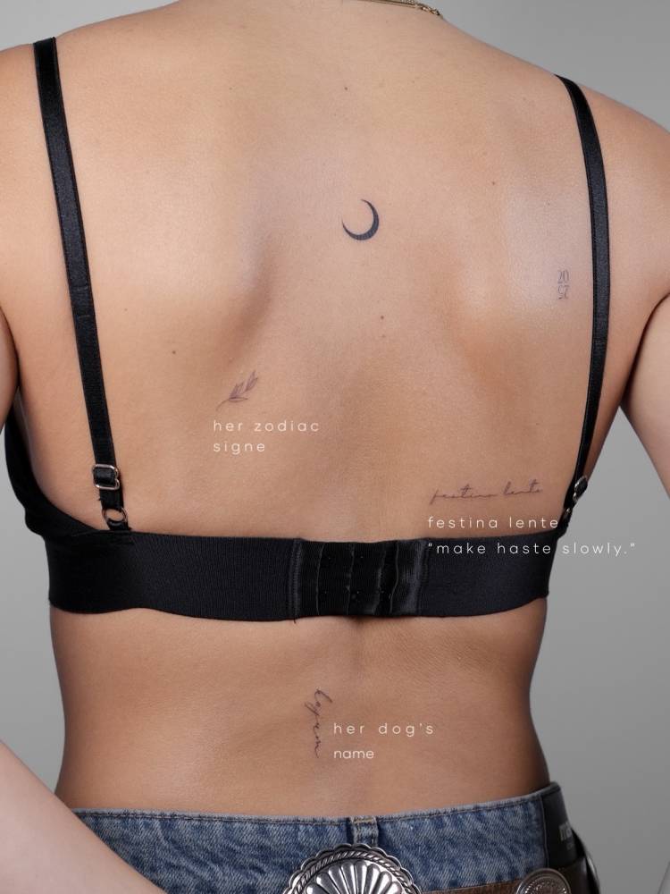 Back composition tattoos in fine line style.