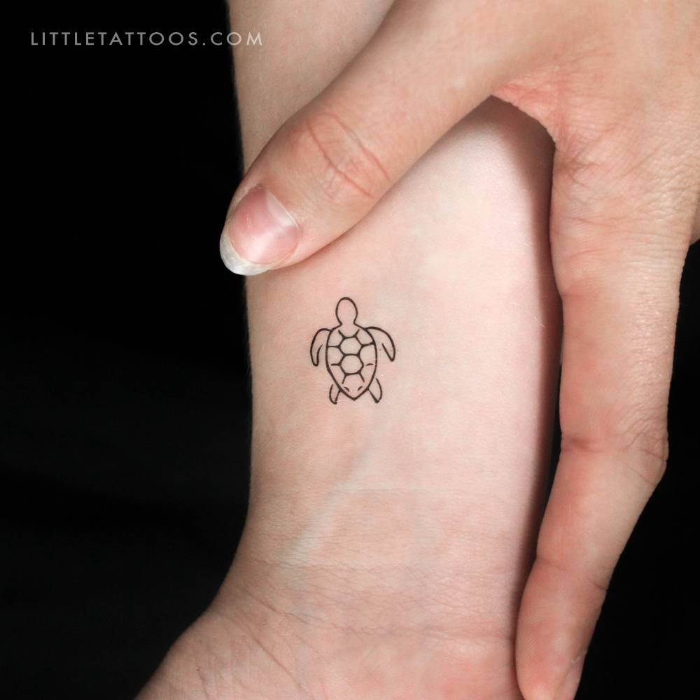 Little turtle temporary tattoo in minimalist style.