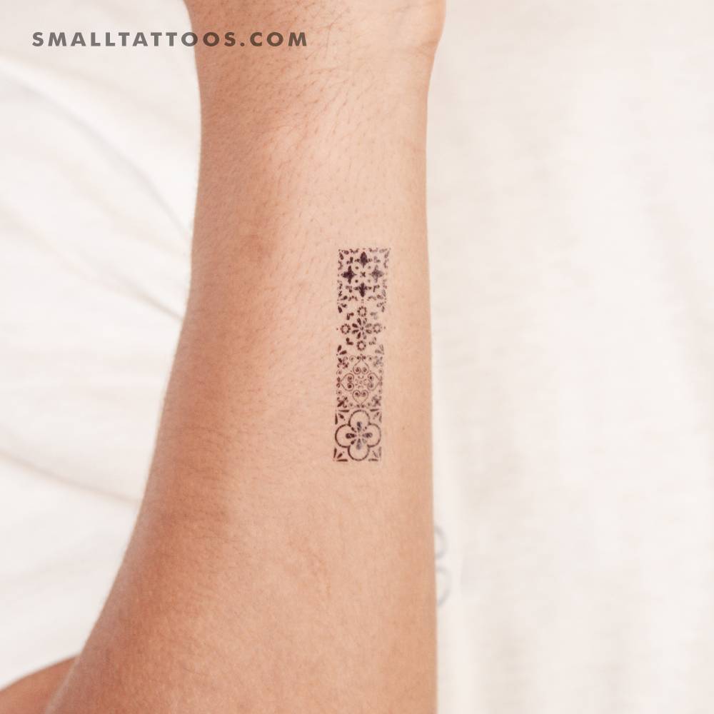 Four Portuguese tiles temporary tattoo located on the wrist.