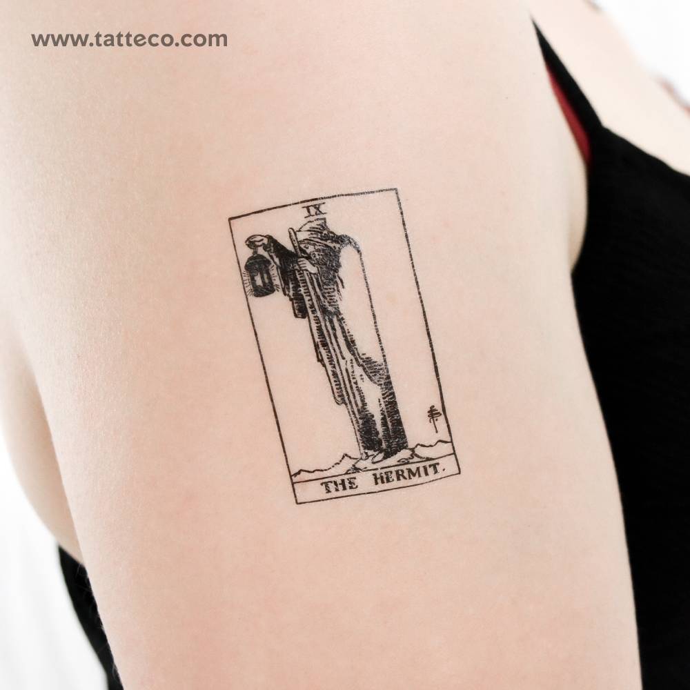 The hermit tarot card temporary tattoo located on the upper arm.