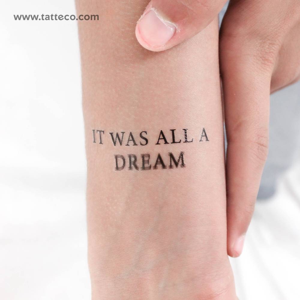 "It was all a dream" temporary tattoo located on the wrist.