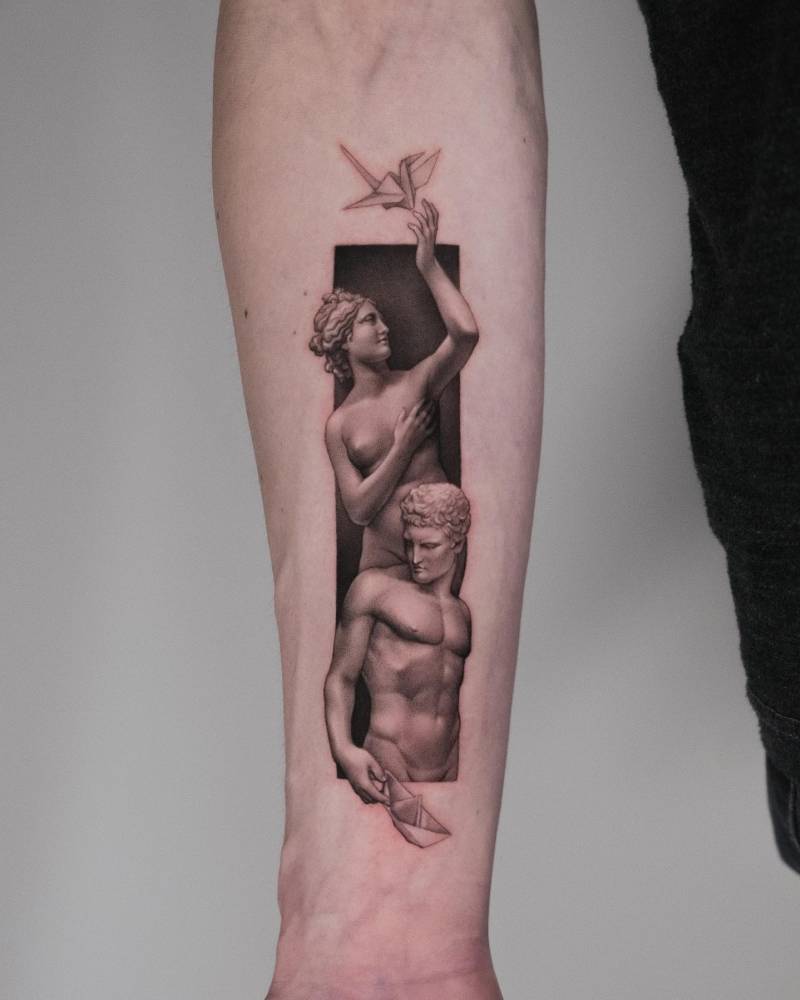 Greek sculptures tattoo in micro-realistic style located on the inner forearm.