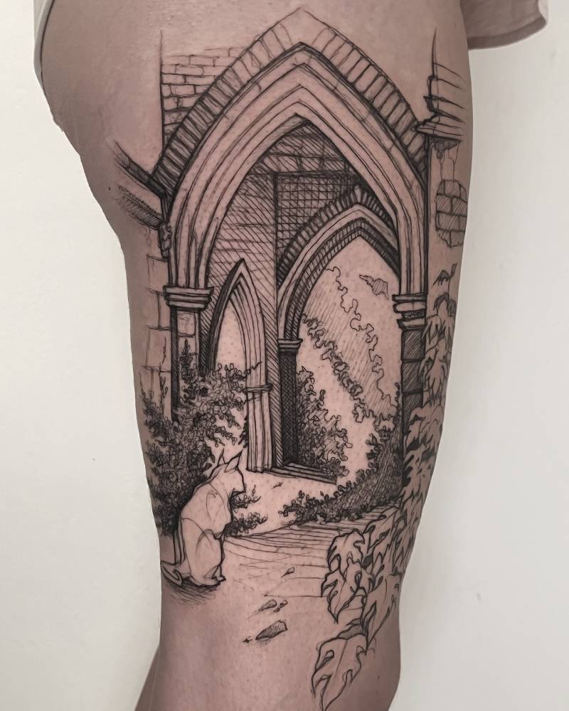 Sketch work style archway tattoo located on the thigh.