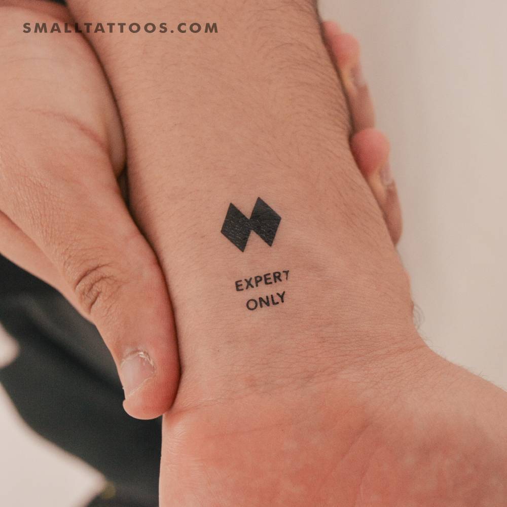 Expert only temporary tattoo located on the wrist.