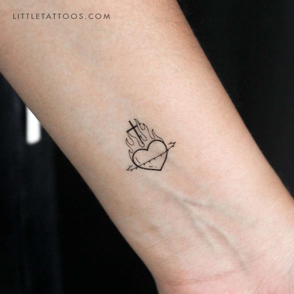 Sacred heart temporary tattoo located on the wrist.