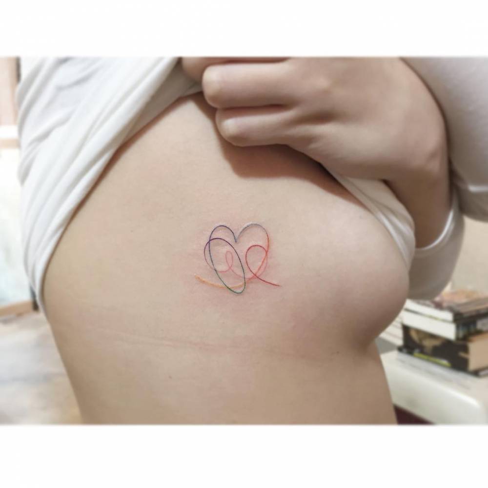 BTS heart tattoo located on the side boob.