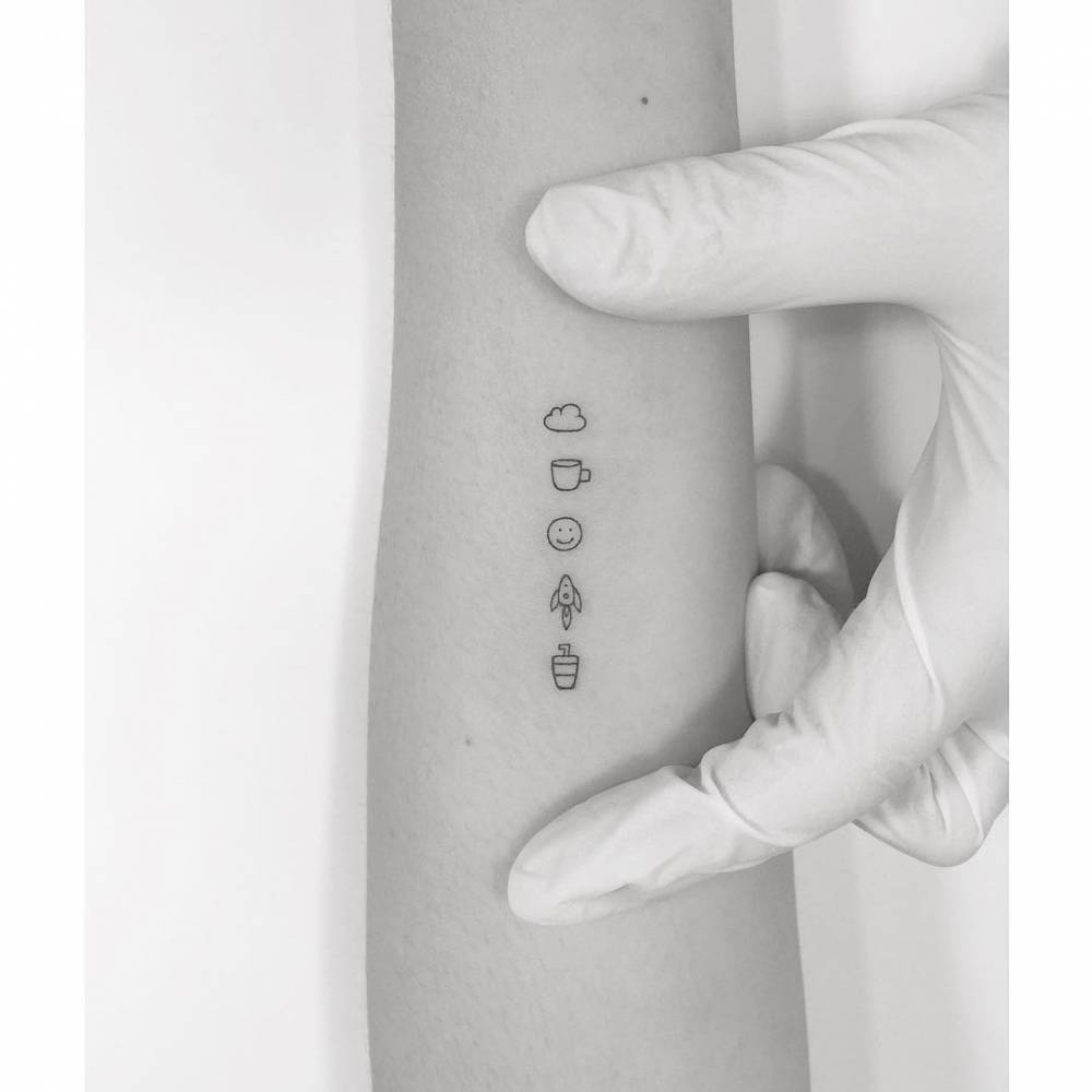 Tiny minimalistic tats located on the inner forearm.