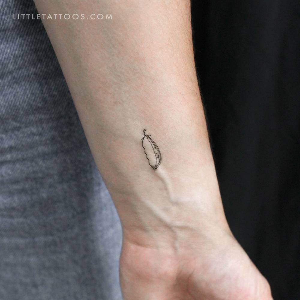 Peas temporary tattoo located on the wrist.