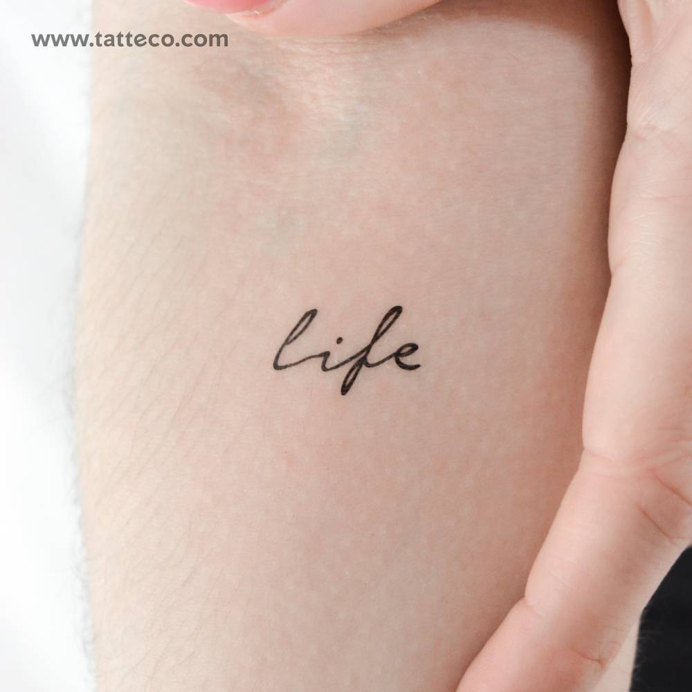 Word "life" temporary lettering tattoo.