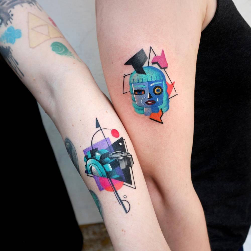 Gears and Motherboard from Cyberchase tattoos in abstract style.