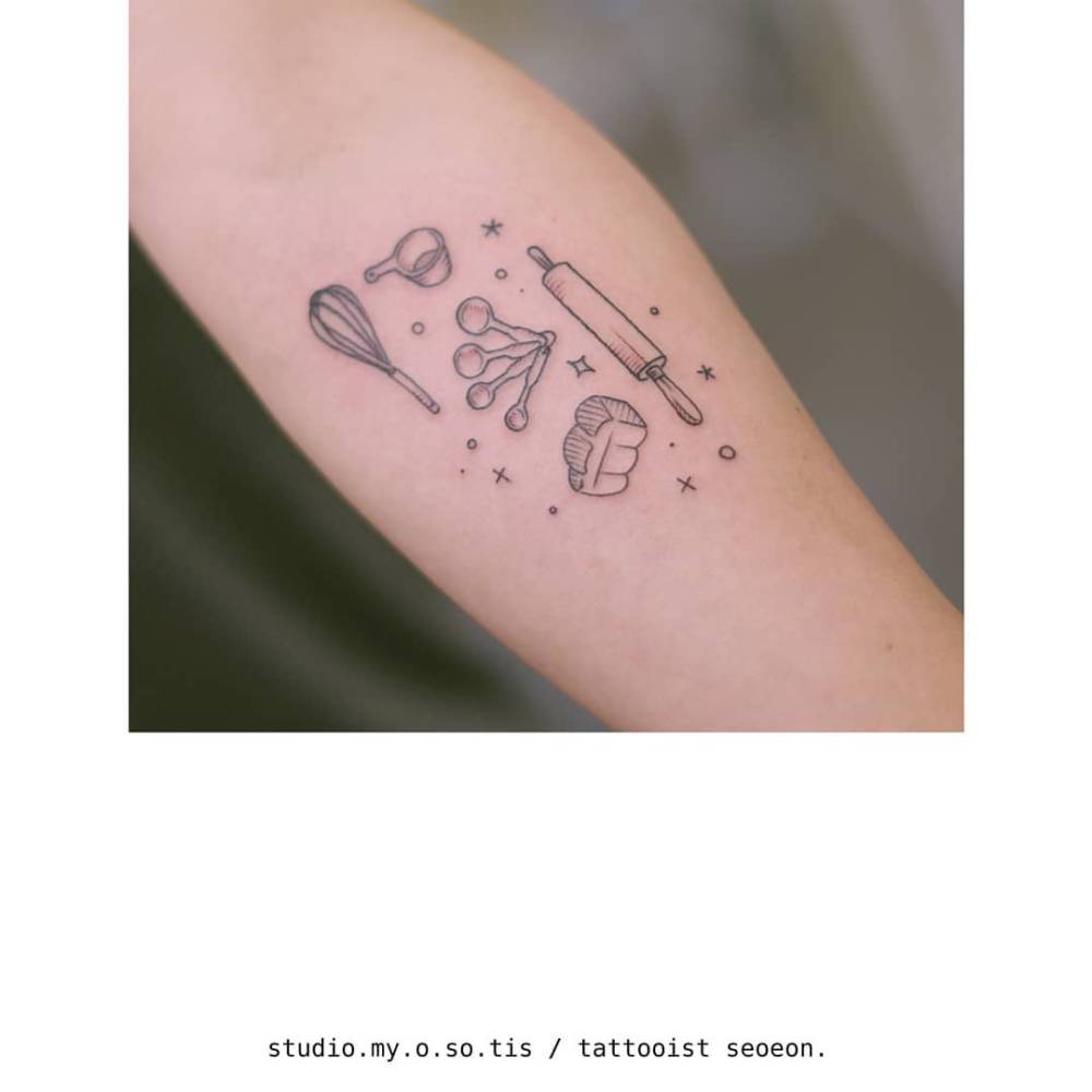 Kitchenware tattoo in fine line style located on the inner forearm.