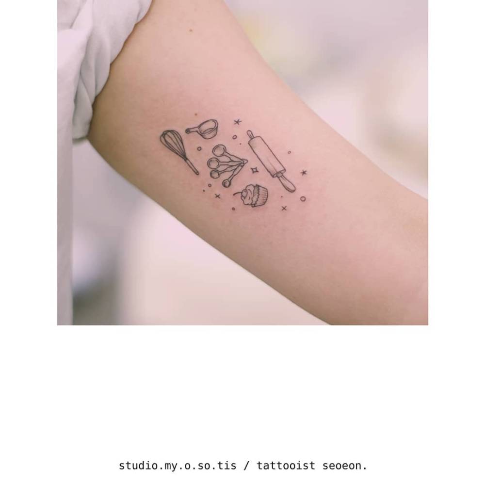 Kitchenware tattoo in fine line style located on the inner arm.