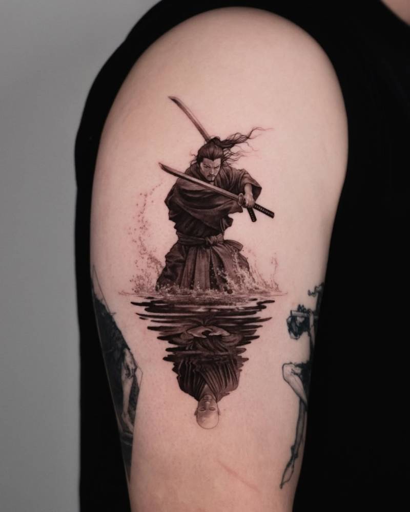 Samurai tattoo located on the upper arm, done in micro-realistic style.