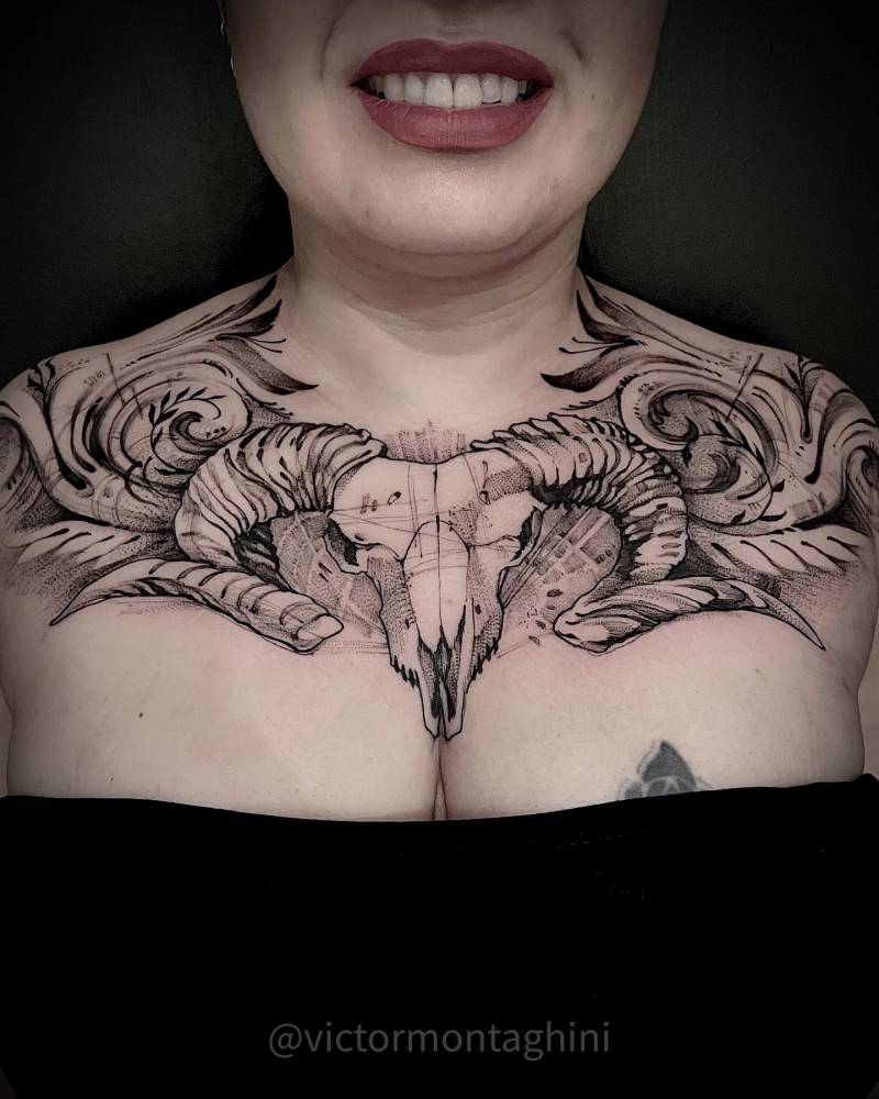 Ram skull tattoo in sketch work style located on the chest.