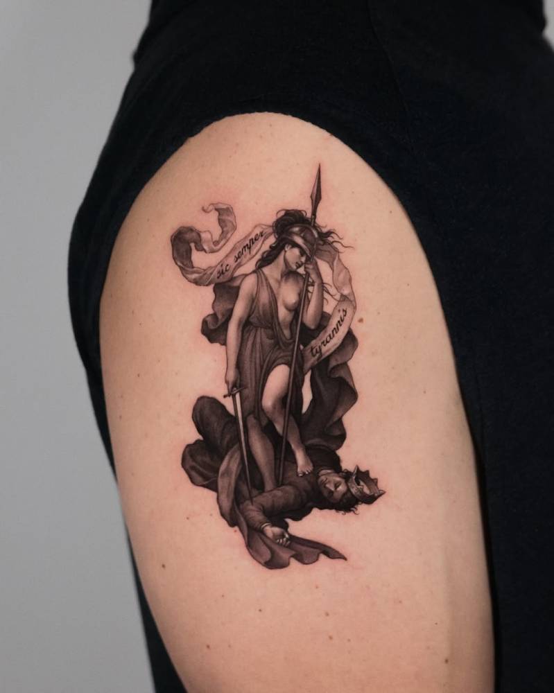 Seal from the flag of Virginia tattooed on the upper arm.