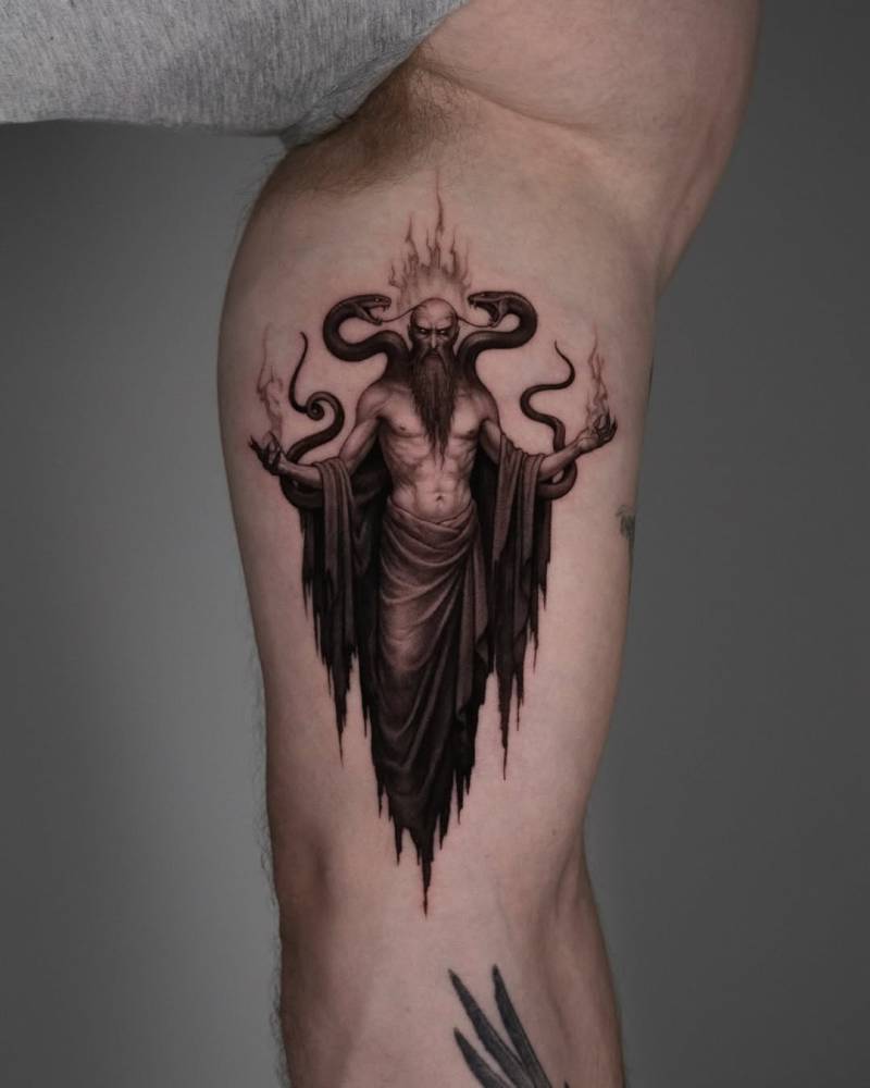Zahhak tattoo in classical style located on the inner arm.