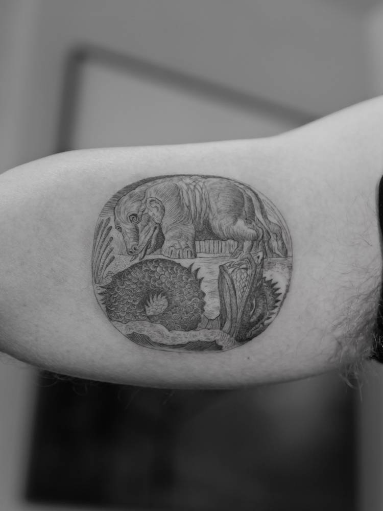 William Blake’s Behemoth and Leviathan tattooed on D.B. Weiss' inner arm.