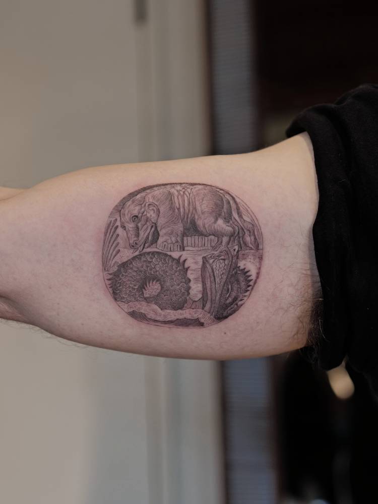 William Blake’s Behemoth and Leviathan tattooed on D.B. Weiss' inner arm.