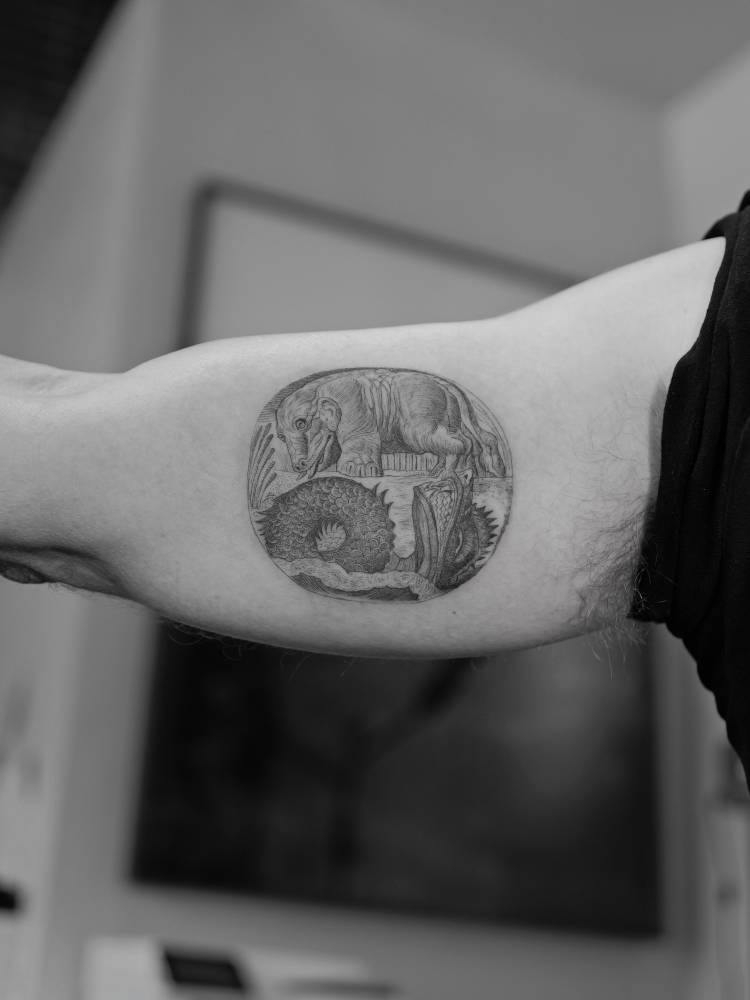 William Blake’s Behemoth and Leviathan tattooed on D.B. Weiss' inner arm.