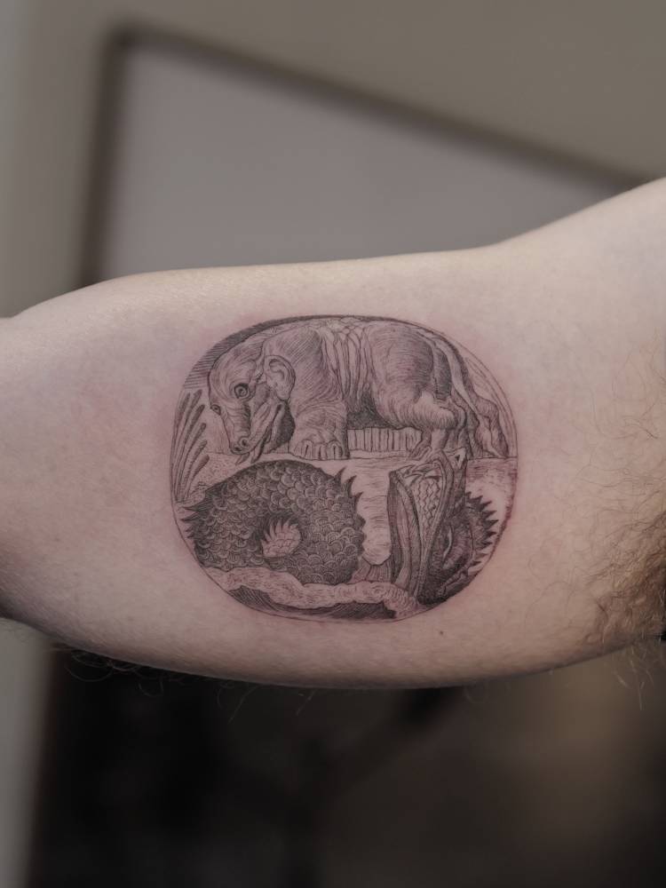 William Blake’s Behemoth and Leviathan tattooed on D.B. Weiss' inner arm.