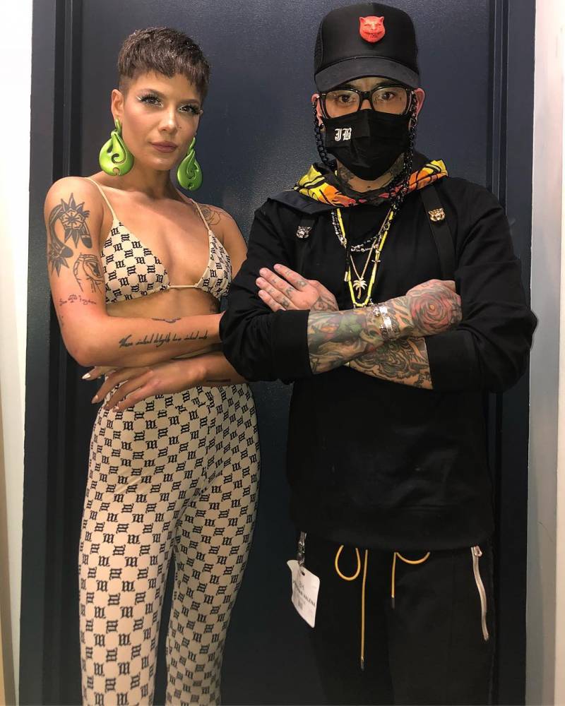 Lettering tattoo done on Halsey's upper arm.