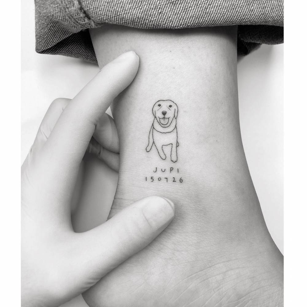 Minimalistic Golden Retriever tattoo located on the ankle.
