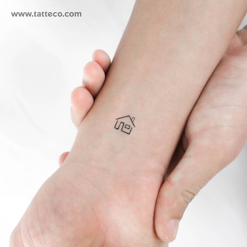 Tiny minimalist house temporary tattoo.