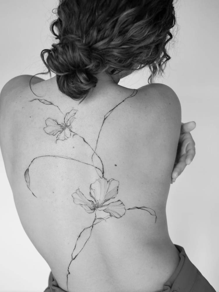 Floral design in illustrative style located on the back.