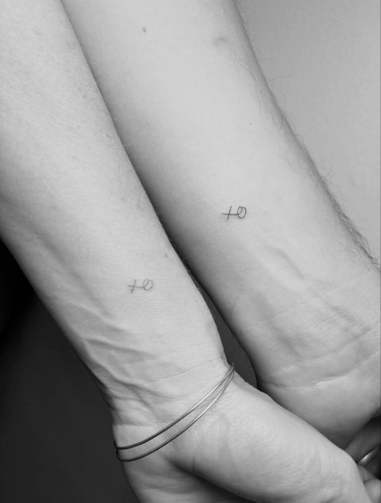 "XO", a little lovers tattoo!
