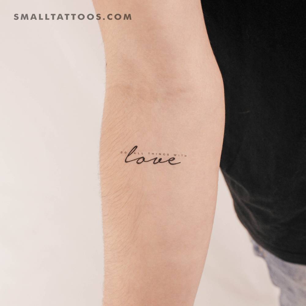 "Do all things with love" temporary tattoo located on the inner forearm.