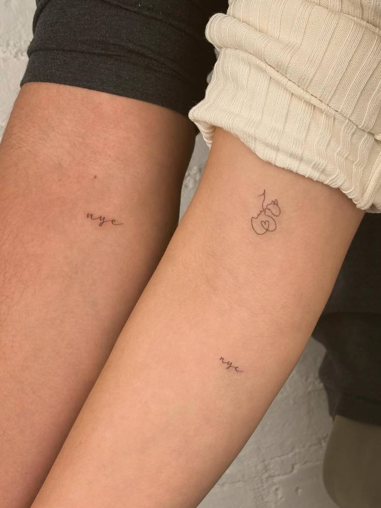Matching "NYC" lettering tattoo for best friends.
