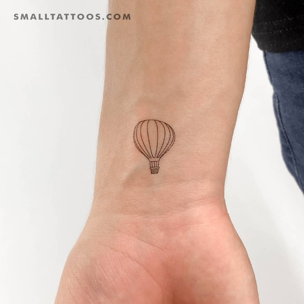 Hot air balloon temporary tattoo in fine line style.